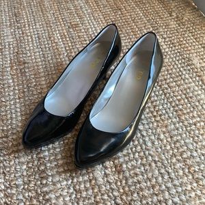 Black leather me too kitten heels
